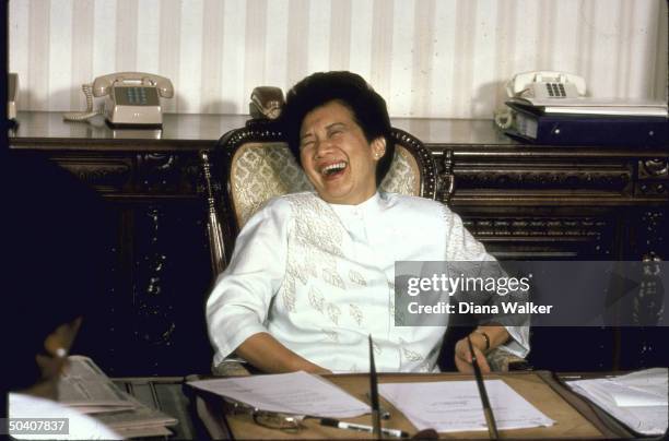 Philippine Pres. Mrs. Benigno S. Aquino Jr., laughing during her interview with TIME.