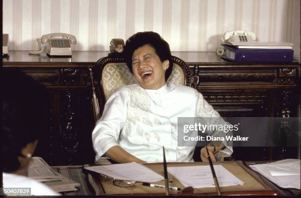 Philippine Pres. Mrs. Benigno S. Aquino Jr., laughing during her interview with TIME.