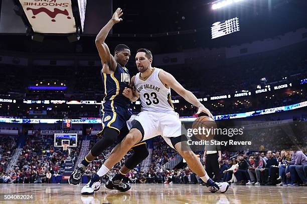 Ryan Anderson of the New Orleans Pelicans works against Glenn Robinson III of the Indiana Pacers during the second half of a game at Smoothie King...