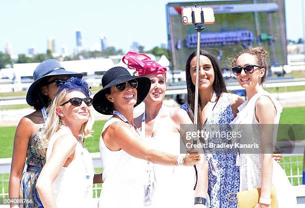 Group of young ladies enjoy their day at the Magic Millions Raceday at Gold Coast Turf Club on January 9, 2016 in Gold Coast, Australia.