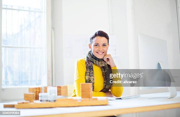 beautiful female architect at work - new business model stock pictures, royalty-free photos & images