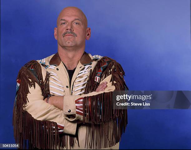 Minnesota Gov-elect Jesse Ventura, former pro wrestler, in serious portrait.
