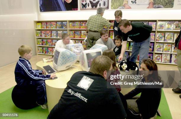 Customers at Apple retail store, which Apple opened to provide direct sales to consumers of Apple and associated products.