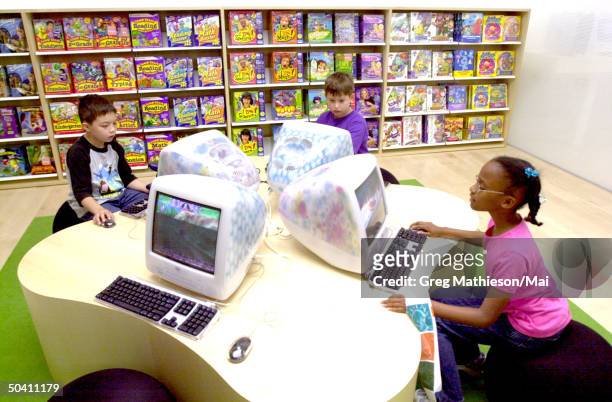Young customers at Apple retail store, which Apple opened to provide direct sales to consumers of Apple and associated products.
