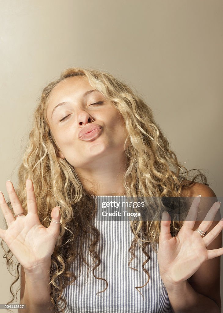 Woman kissing glass