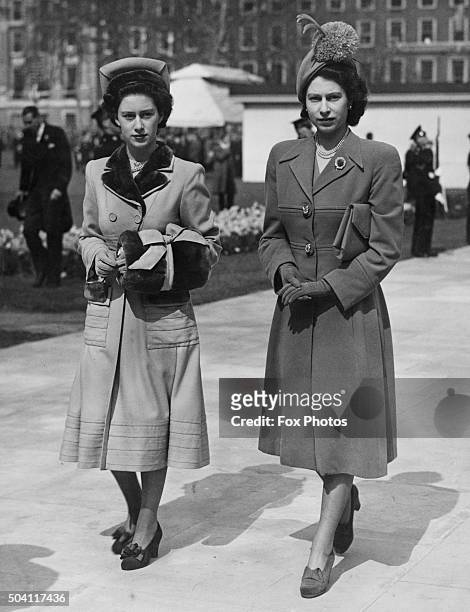 Princess Margaret and her sister, Princess Elizabeth leaving Grosvenor Square, London, after the unveiling of the memorial to American President...
