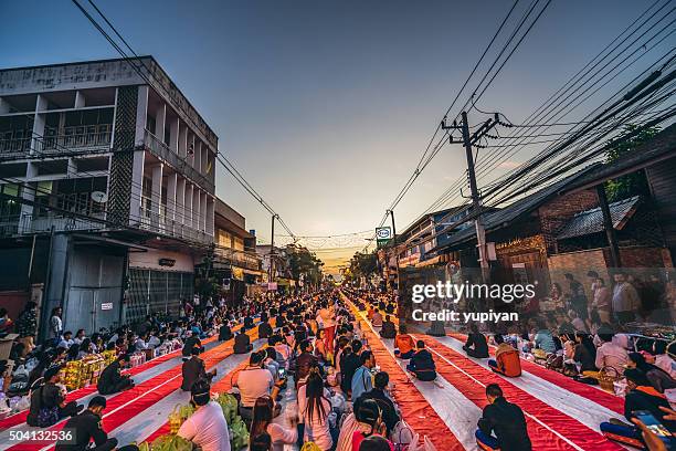 ceremony of international alms offering to 10,000 monks - alms stock pictures, royalty-free photos & images