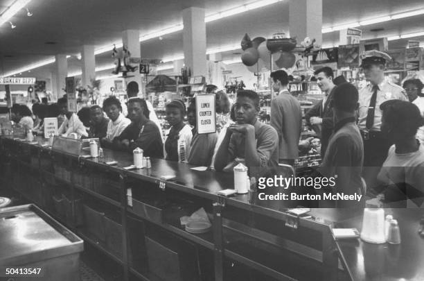 Members demonstrating for lunch counter integration.