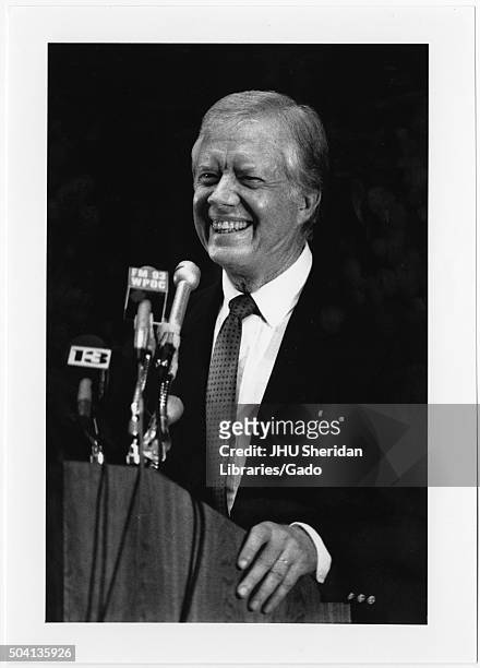 Candid photograph of former President James Earl Carter, Jr at a press conference after receiving the Albert Schweitzer award for Humanitarianism,...