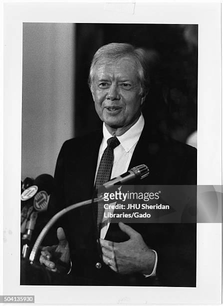 Albert Schweitzer Prize for Humanitarianism, James Earl Carter, Jr [Jimmy] Candid photograph, Carter at press conference after receiving award, 1987....