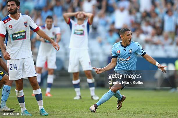 Ali Abbas of Sydney FC celebrates scoring a goal during the round 14 A-League match between Sydney FC and the Newcastle Jets at ANZ Stadium on...