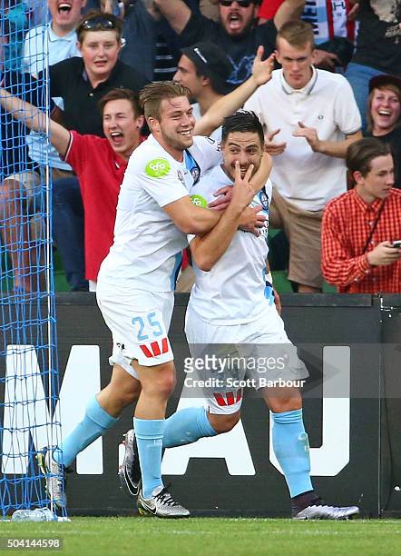 Bruno Fornaroli of City FC is congratulated by Jacob Melling after scoring the second goal during the round 14 A-League match between Melbourne City...