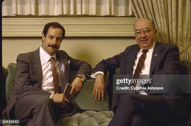 Republican Senator from North Carolina Jesse A. Helms sitting on couch with Time Correspondent Ted Gup for interview, in Helms' office.