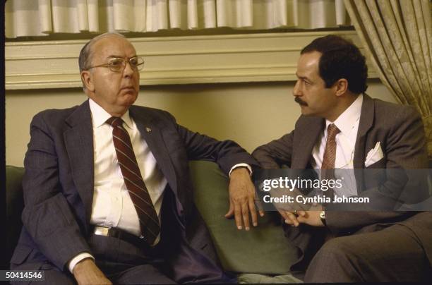 Republican Senator from North Carolina Jesse A. Helms sitting on couch with Time Correspondent Ted Gup for interview, in Helms' office.