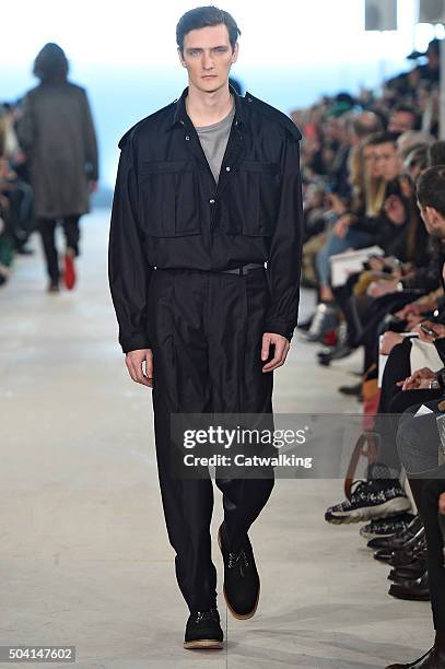 Model walks the runway at the E.Tautz Autumn Winter 2016 fashion show during London Menswear Fashion Week on January 9, 2016 in London, United...