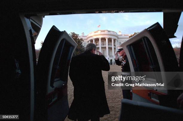 President George W. Bush arriving at the White House aboard Marine One.
