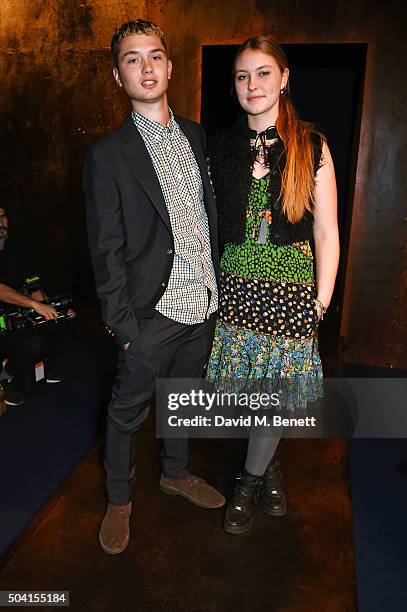 Rafferty Law and Ella Dallaglio attend the Coach FW16 show front row during London Collections Men at The Lindley Hall on January 9, 2016 in London,...