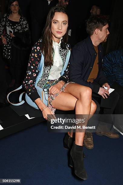 Matilda Lowther and Joe Dempsie attend the Coach FW16 show front row during London Collections Men at The Lindley Hall on January 9, 2016 in London,...