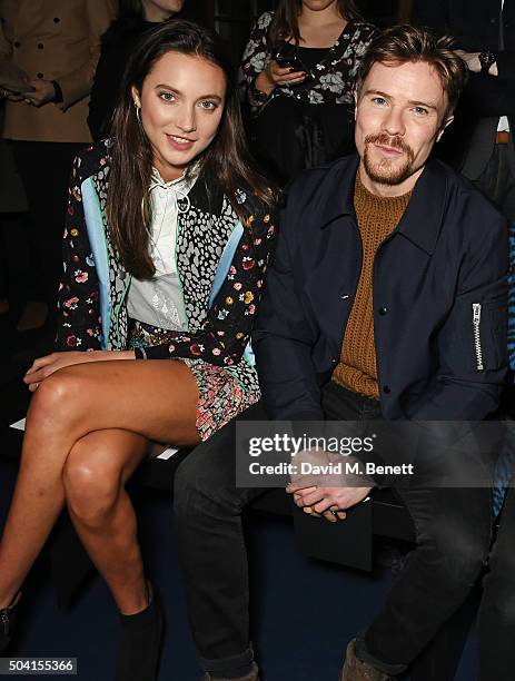 Matilda Lowther and Joe Dempsie attends the Coach FW16 show front row during London Collections Men at The Lindley Hall on January 9, 2016 in London,...