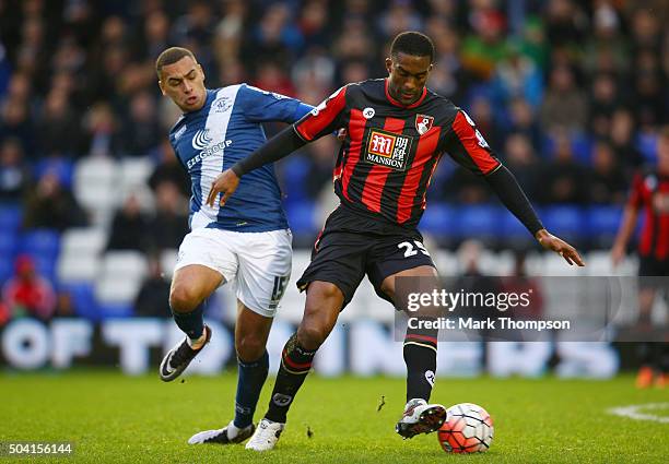 Sylvain Distin of Bournemouth and James Vaughan of Birmingham City compete for the ball during the Emirates FA Cup Third Round match between...