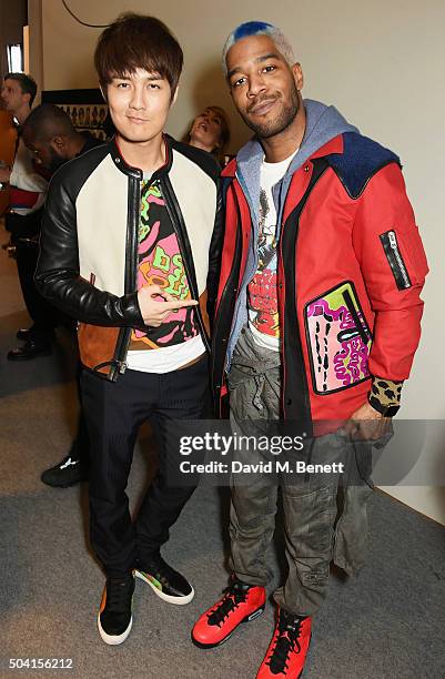 Kenji Wu and Kid Cudi attend the Coach FW16 show front row during London Collections Men at The Lindley Hall on January 9, 2016 in London, England.