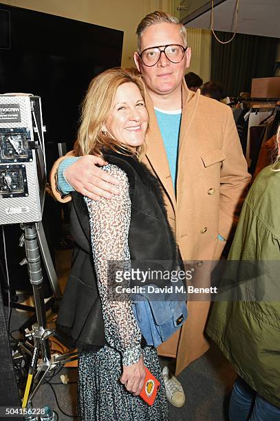 Jane Bruton and Giles Deacon attend the Coach FW16 show front row during London Collections Men at The Lindley Hall on January 9, 2016 in London,...