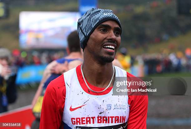 Mo Farah of Great Britain finishes second in the Men's 8Km race during the Great Edinburgh X Country in Holyrood Park on January 09, 2016 in...
