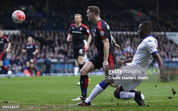 Mustafa Carayol of Leeds United FC passes the ball under pressure from Paul Green of Rotherham United FC during The Emirates FA Cup Third Round match...