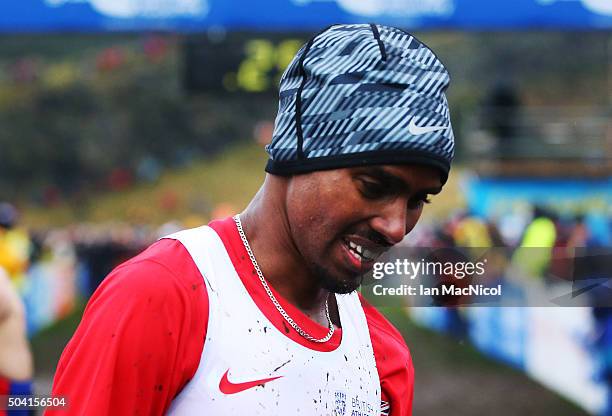 Mo Farah of Great Britain finishes second in the Men's 8Km race during the Great Edinburgh X Country in Holyrood Park on January 09, 2016 in...