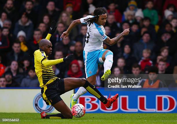 Kevin Nbabu of Newcastle United and Allan-Romeo Nyom of Watford compete for the ball during the Emirates FA Cup Third Round match between Watford and...