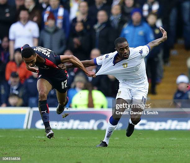 Grant Ward of Rotherham United FC pulls on Mustafa Carayol of Leeds United FC during The Emirates FA Cup Third Round match between Leeds United and...