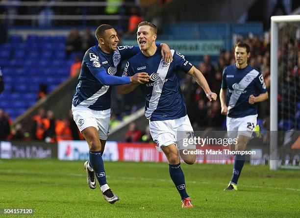 Michael Morrison of Birmingham City celebrates scoring his team's first goal with his team mate James Vaughan during the Emirates FA Cup Third Round...