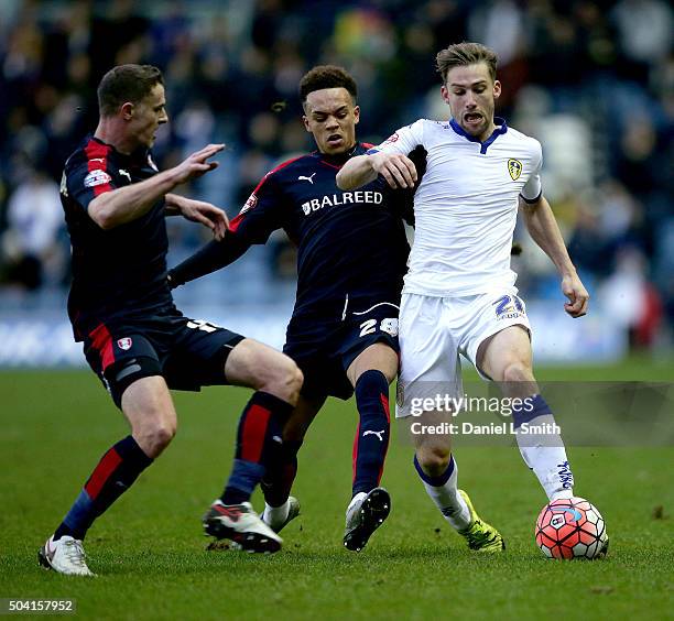 Charlie Taylor of Leeds United FC maintains control over Shay Facey of Rotherham United FC during The Emirates FA Cup Third Round match between Leeds...