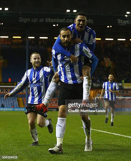 Atdhe Nuhiu of Sheffield Wednesday is congratulated on his goal during The Emirates FA Cup Third Round match betwen Sheffield Wednesday and Fulham at...