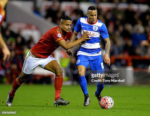 Michael Mancienne of Nottingham Forest tackles Tjaronn Chery of Queens Park Rangers during The Emirates FA Cup Third Round match between Nottingham...