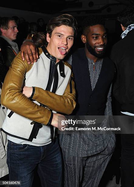 Oliver Cheshire and Tinie Tempah attend the Oliver Spencer show during The London Collections Men AW16 at 108 The Strand on January 9, 2016 in...