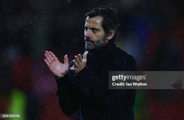 Quique Flores manager of Watford applauds the crowd after victory in the Emirates FA Cup Third Round match between Watford and Newcastle United at...