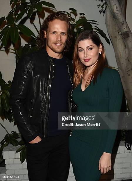 Actors Sam Heughan and Trace Lysette attend the STARZ Pre-Golden Globe Celebration at Chateau Marmont on January 8, 2016 in Los Angeles, California.