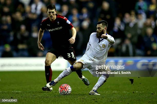 Mirco Antenucci of Leeds United FC controls the ball over Richard Smallwood of Rotherham United FC during The Emirates FA Cup Third Round match...