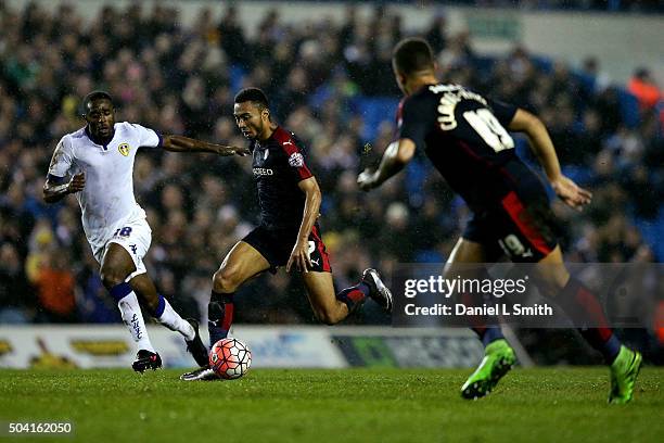 Grant Ward of Rotherham United FC maintains possession over Mustafa Carayol of Leeds United FC during The Emirates FA Cup Third Round match between...