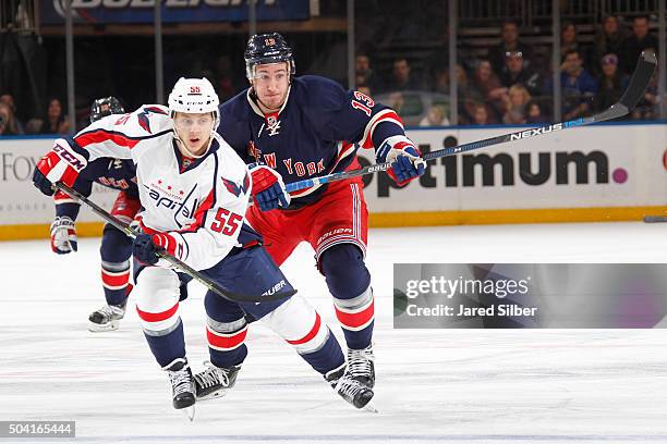 Kevin Hayes of the New York Rangers skates against Aaron Ness of the Washington Capitals at Madison Square Garden on January 9, 2016 in New York City.