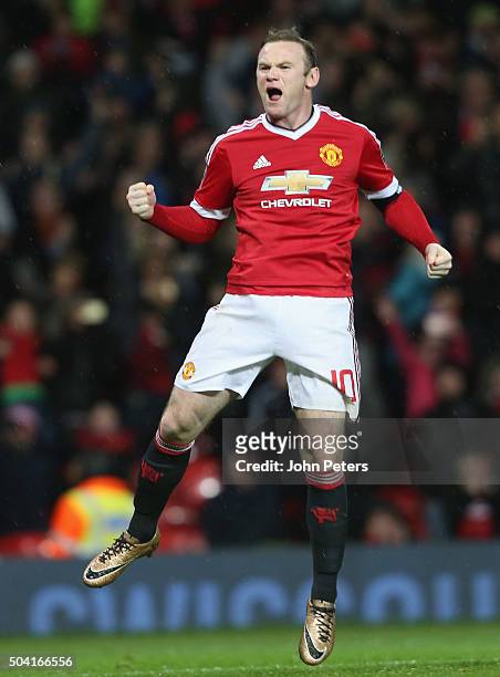 Wayne Rooney of Manchester United celebrates scoring their first goal during the Emirates FA Cup Third Round match between Manchester United and...