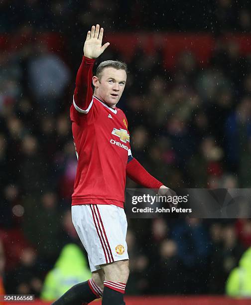 Wayne Rooney of Manchester United celebrates scoring their first goal during the Emirates FA Cup Third Round match between Manchester United and...