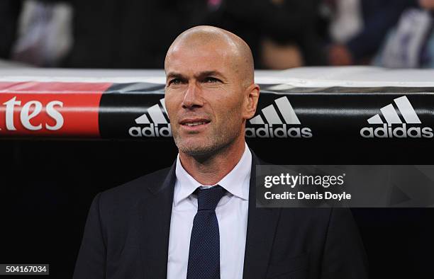 Zinedine Zidane manager of Real Madrid looks on prior to the La Liga match between Real Madrid CF and RC Deportivo La Coruna at Estadio Santiago...