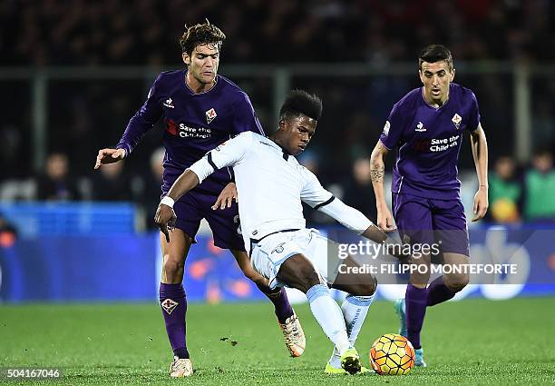 Lazio's forward from Senegal Balde Diao Keita vies with Fiorentina's defender from Spain Marcos Alonso Mendoza during the Italian Serie A football...