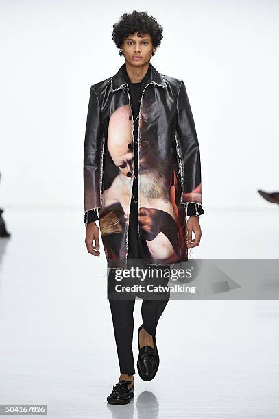 Model walks the runway at the Matthew Miller Autumn Winter 2016 fashion show during London Menswear Fashion Week on January 9, 2016 in London, United...