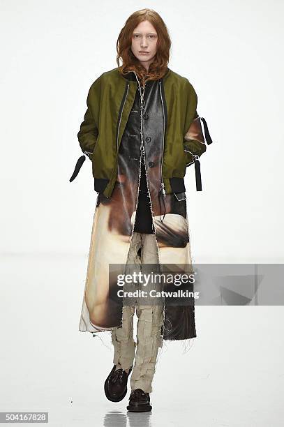 Model walks the runway at the Matthew Miller Autumn Winter 2016 fashion show during London Menswear Fashion Week on January 9, 2016 in London, United...