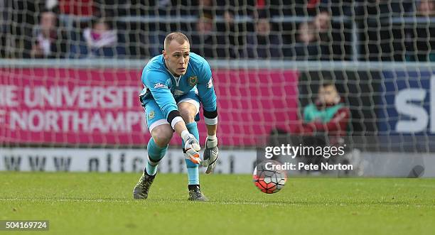 Cody Cropper of Milton Keynes Dons in action during The Emirates FA Cup Third Round match between Northampton Town and Milton Keynes Dons at...