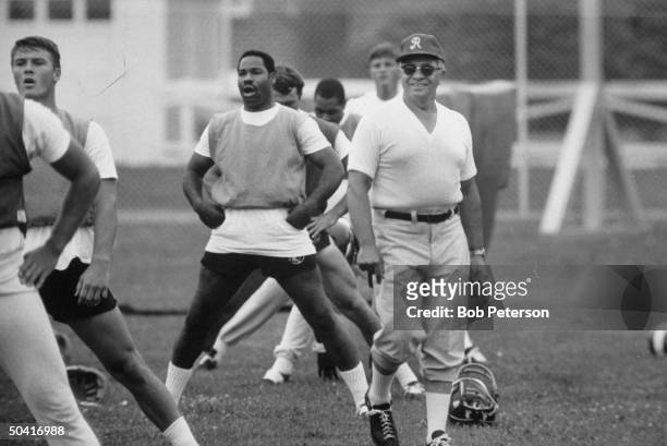 Redskins Coach, Vince Lombardi , leading his men in practice session, at R. F. K. Memorial Stadium.