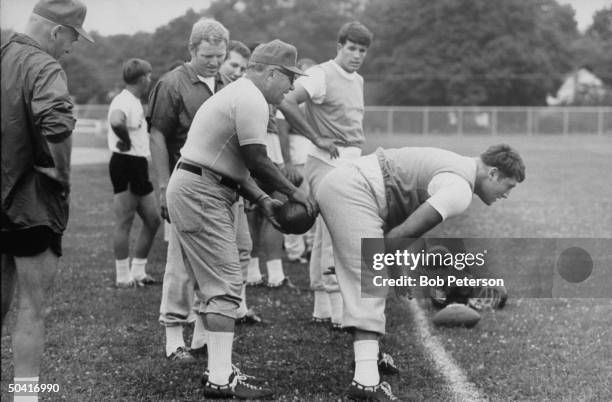 Redskins quarterback, Sonny Jurgensen and Coach, Vince Lombardi , during practice, at R. F. K. Memorial Stadium.